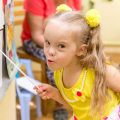 What does speech therapy target for down syndrome?